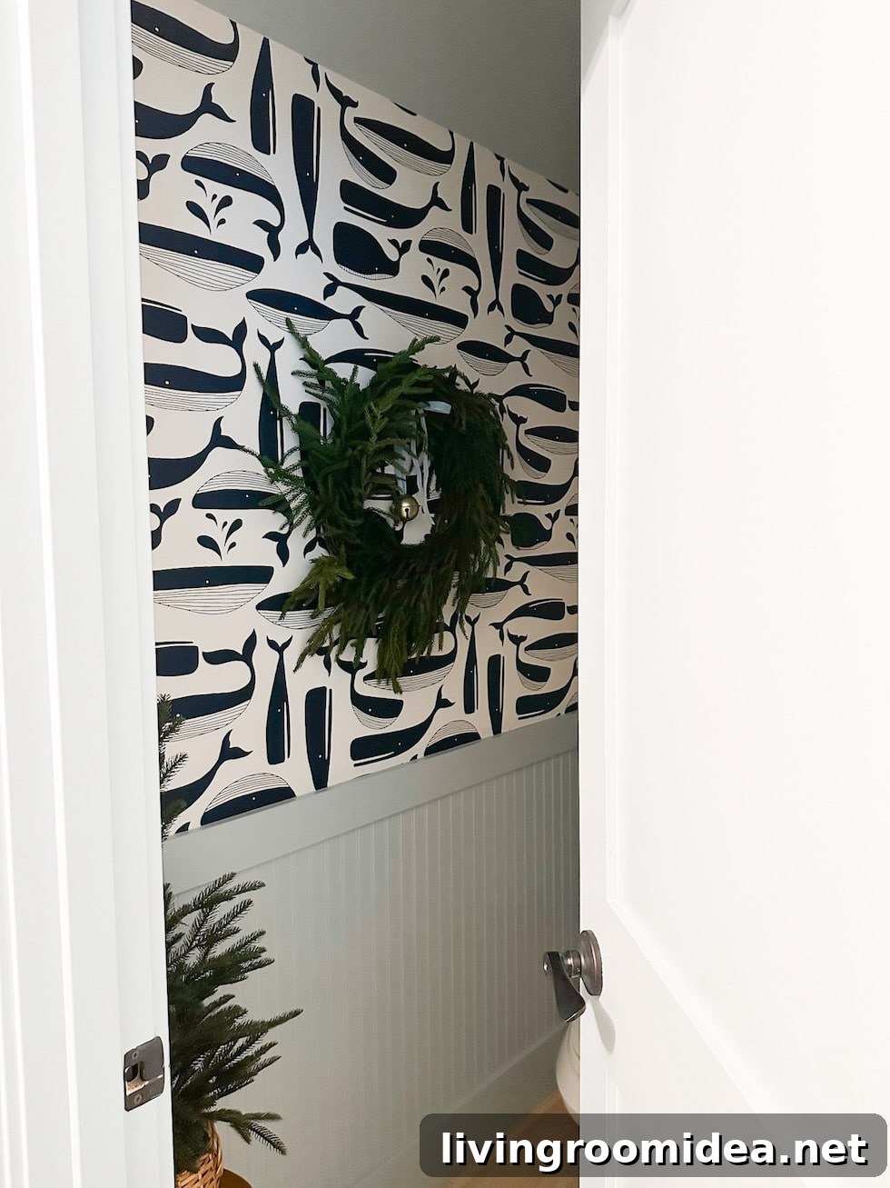 whale wallpaper, powder room in a coastal home