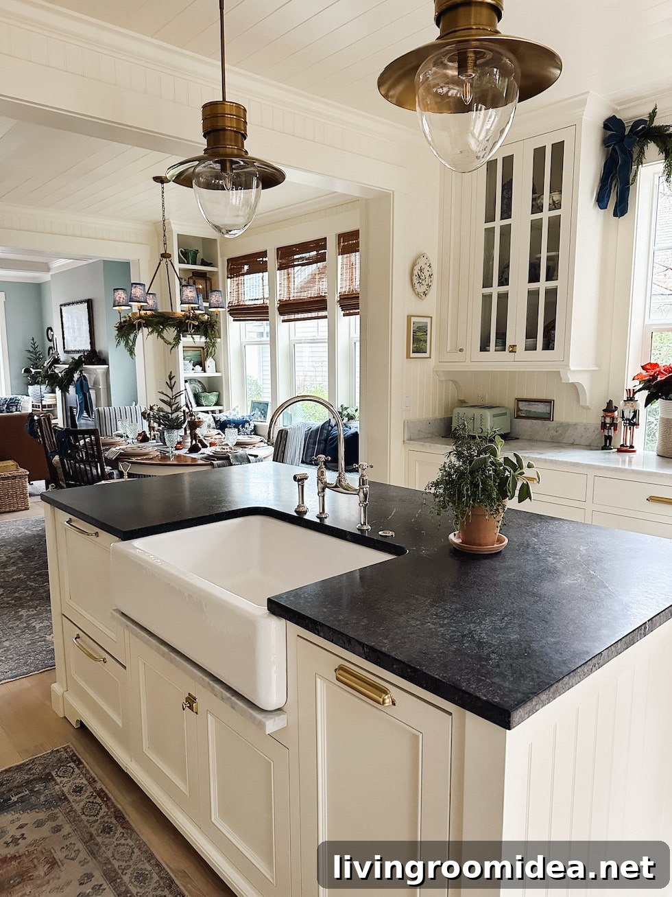 English-inspired kitchen and dining nook with built in bookcases in a small coastal home