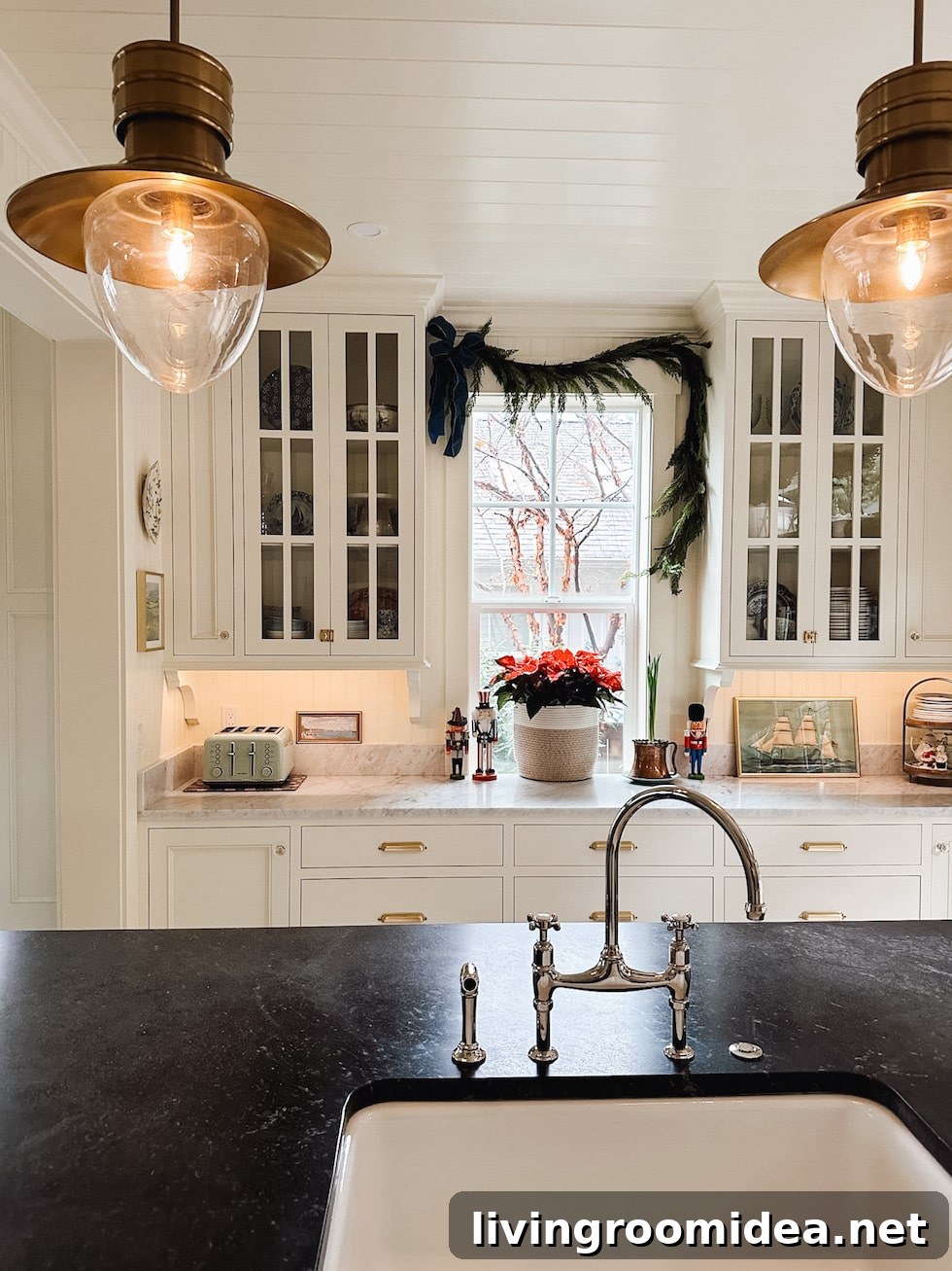 English-inspired kitchen with soapstone and marble counters in a small coastal home