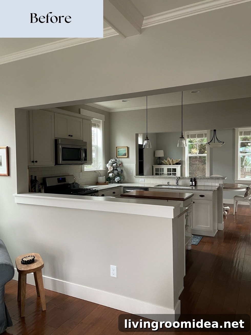 BEFORE Cottage kitchen before swapping the location of the kitchen and dining area to open up a small floor plan in a coastal home 