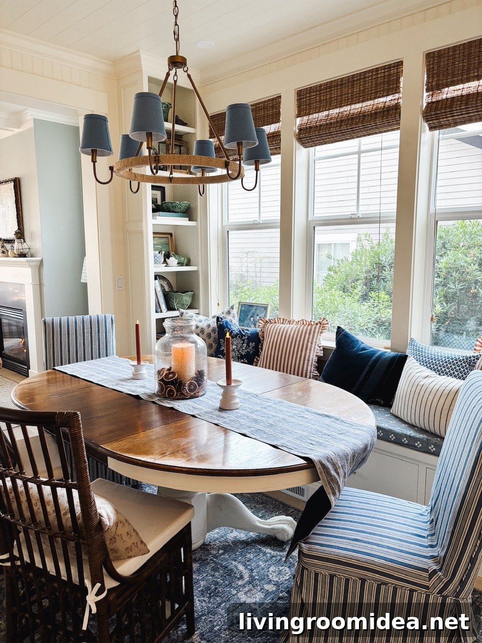 Cottage kitchen dining nook after swapping the location of the kitchen and dining area to open up a small floor plan in a coastal home 