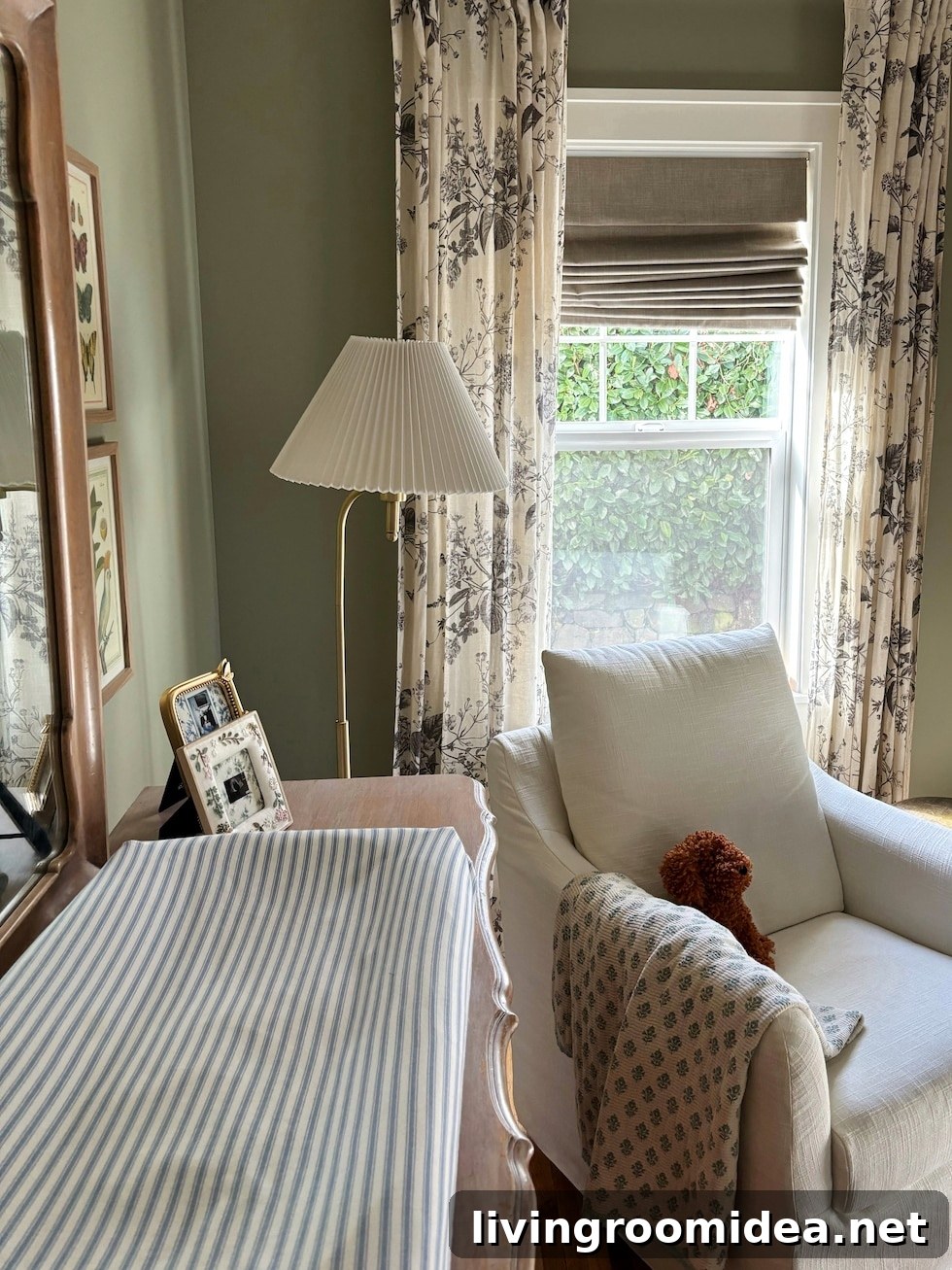 Lila’s Baby Girl Nursery Tour: Charming Room Ideas and Decor 9 Lamp and changing pad