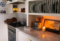 How I Style Garland on Our Stove Hood, Mantel & Staircase