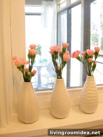 Pretty in Pink: Affordable Floral Arrangements on a Budget 4 Three small bouquets on window ledge