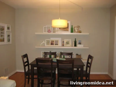 Pendant light over dining area seen from living room