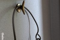 Mystery Hook: Wire Basket Hanging From a Wall Hook