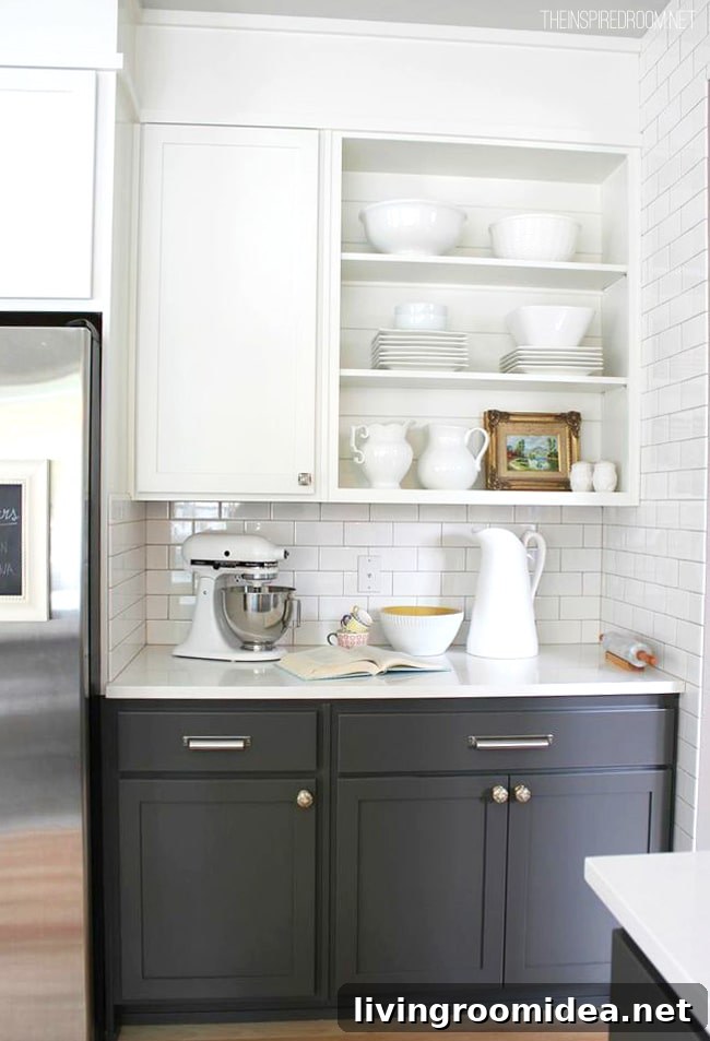 kitchen baking area with open shelving and two toned cabinets
