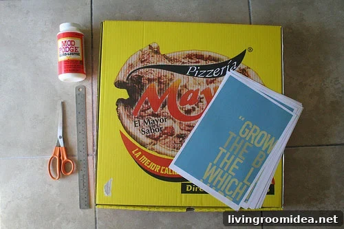 Assorted craft supplies and a pizza box