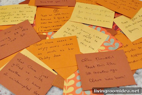 Thanksgiving Thanks Jar gratitude notes spread out on table as part of holiday craft tradition
