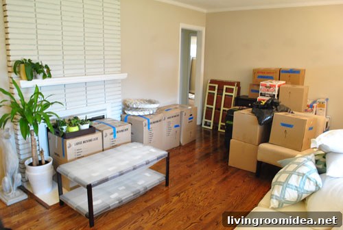 Essential Moving Checklists and Practical Packing Tips 2 Living Room Filled With Moving Boxes And Packed Furniture