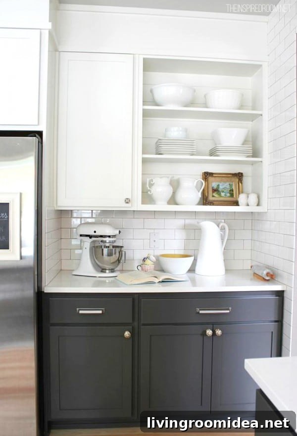 Kitchen baking area with open cabinets and two tone gray and white cabinets