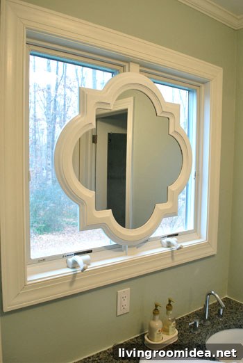 Close-up of painted white mirror frame