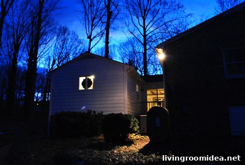 Nighttime exterior view from neighbor's distance