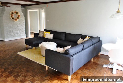 How We Assembled the IKEA Karlstad Sectional Sofa Step-by-Step 4 dark gray Karlstad ikea sectional sofa recently assembled in gray living room with fireplace
