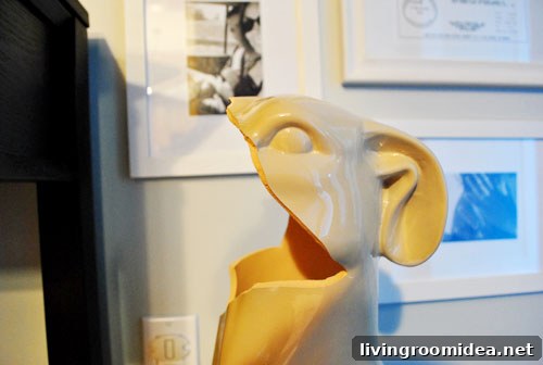 Ceramic dog missing part of its face