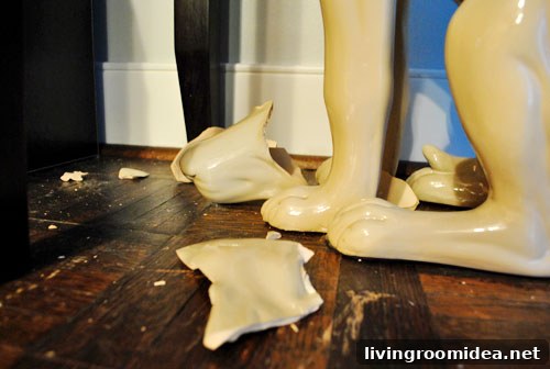 Candlelit vigil for ceramic dog