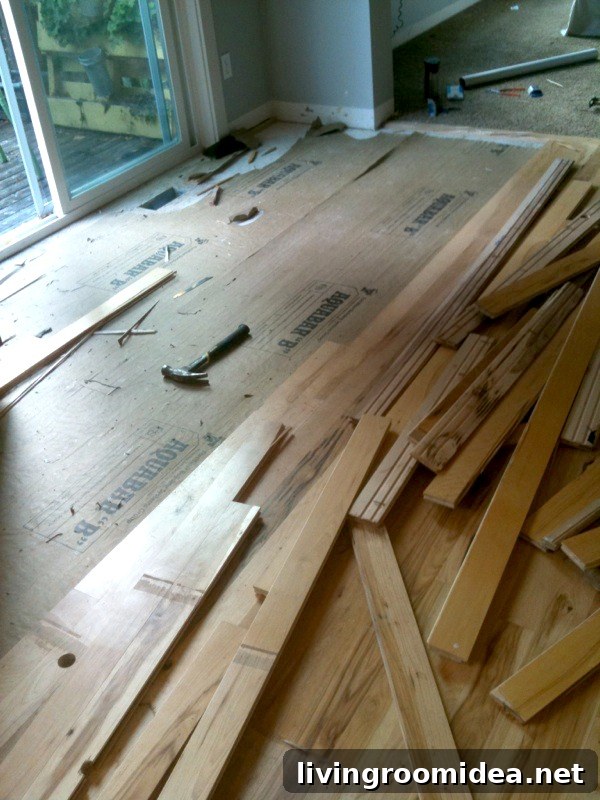 tearing out damaged flooring