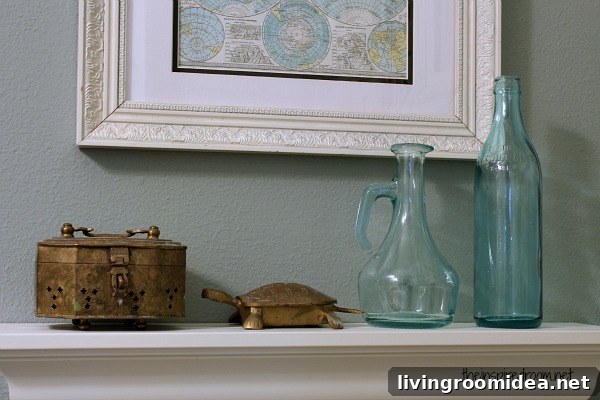 Powder Room Makeover Reveal: Budget-Friendly Second Remodel 12 brass accessories blue bottles