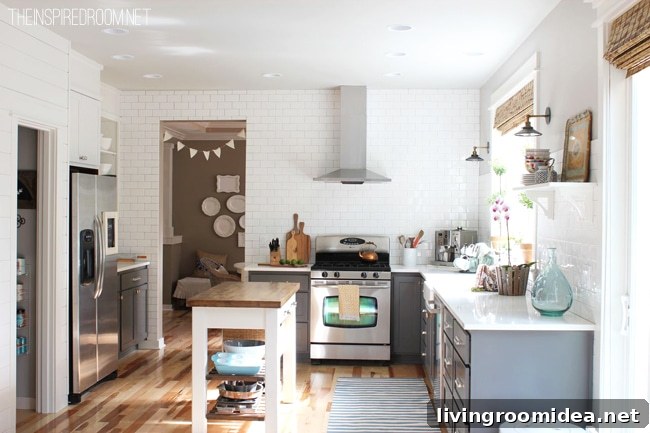 Kitchen Remodel: Before and After Reveal of a Stunning Update 9 Click through to see this amazing kitchen remodel on a budget. You'll find the before and after shots with painted gray painted cabinets!