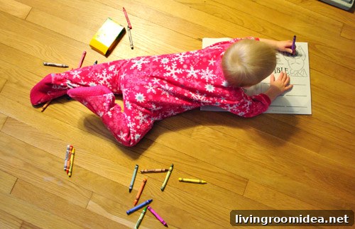DIY Kids Art Desk Built Into a Cabinet Door: Step-by-Step Guide 2 Child coloring at small table