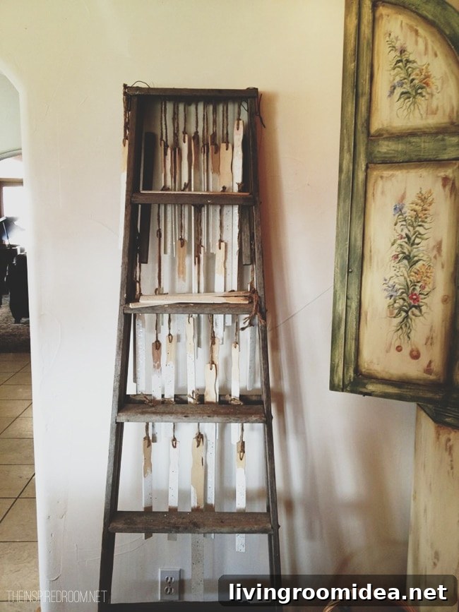 DIY dipped paint sticks on ladder