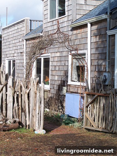 metal arbor and driftwood fence metal arbor and driftwood fence