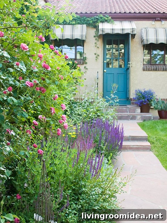 Teal door and pretty flower garden