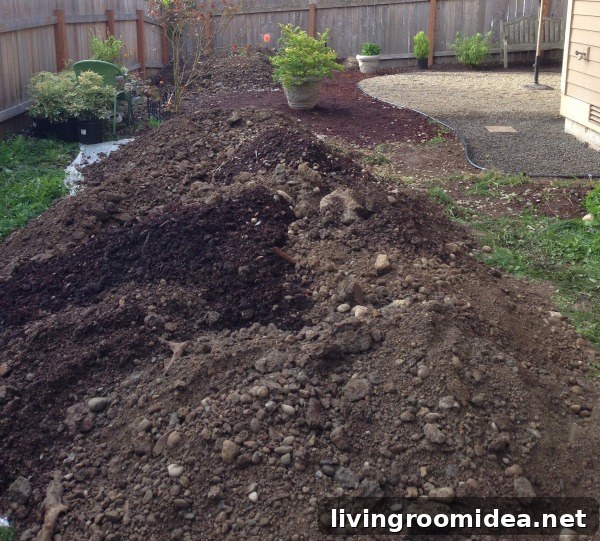 removed dirt for pea gravel patio