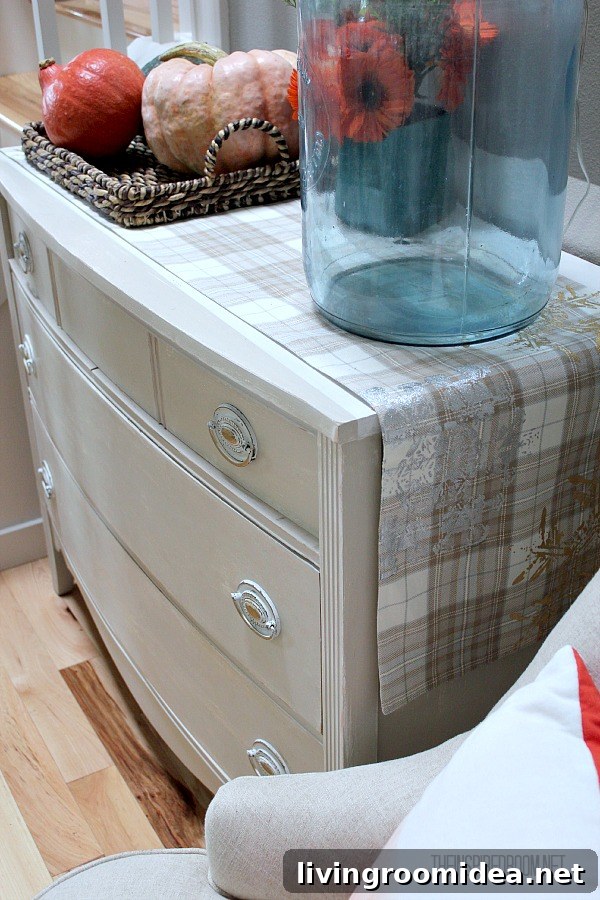 Cozy Fall Entryway Decorating Ideas for a Cheerful Welcome 3 Entry Table Layering for Fall