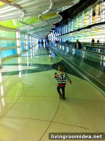 flying with toddler playing in the airport with cool lights
