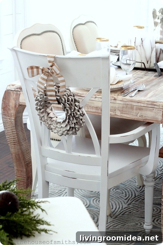 pinecone wreath on back of chair