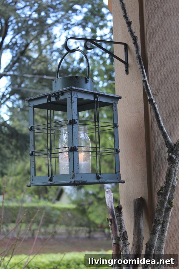 Christmas Decorating Hang Lanterns from Plant Hooks