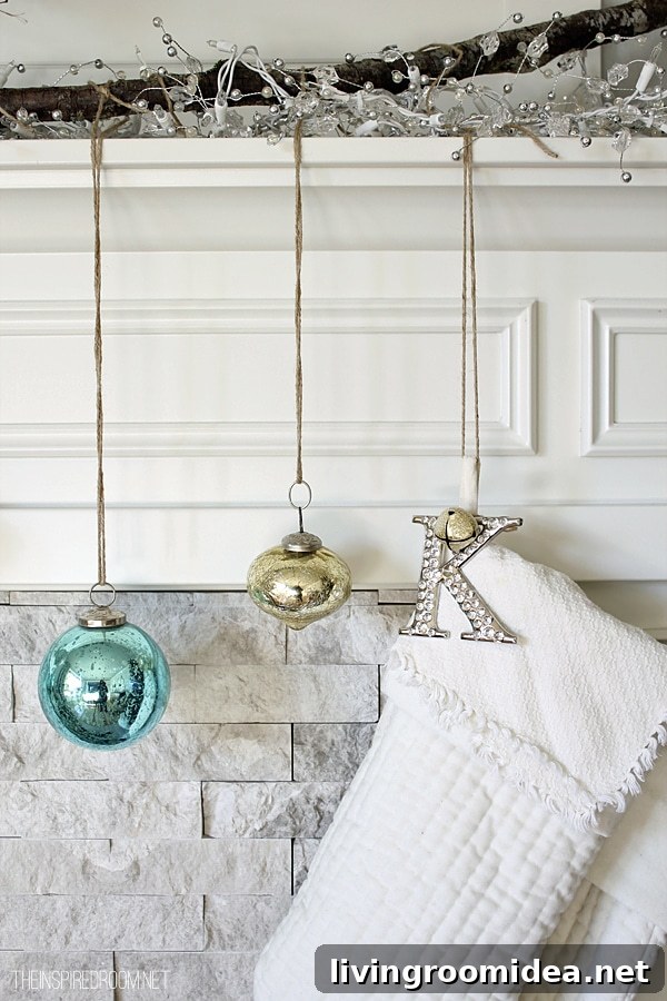 how to hang christmas stockings and garland on mantel