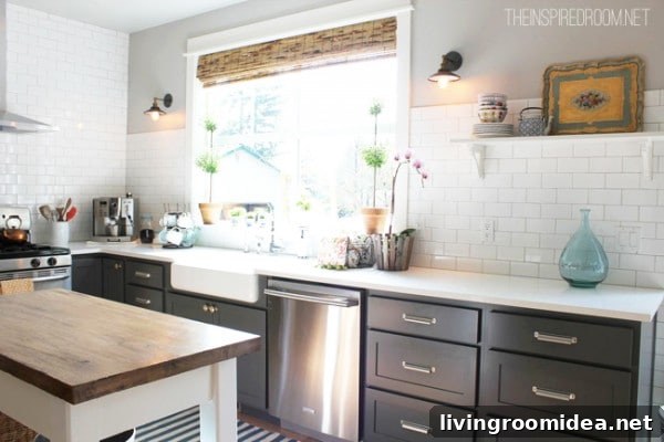 kitchen with grey cabinets and subway tile