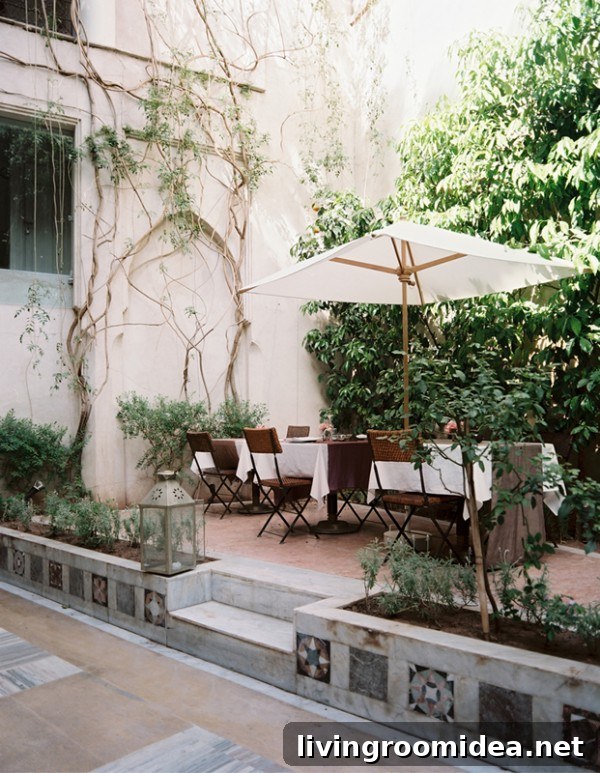 8 Dreamy Spaces to Transform Your Home This Year 9 Beautiful Outdoor Patio with Long Tables and a White Umbrella