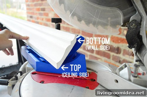 Crown molding ready for cutting on miter saw with kreg crown pro
