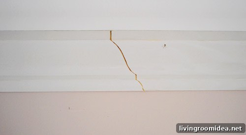 Scarf joint in crown molding where two pieces of molding overlap 