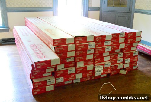Stacked flooring boxes in dining room