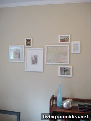 Framed gallery on guest bedroom wall