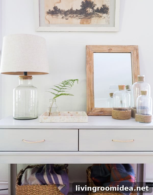 Smart Home Storage: Clever Ways to Organize with Baskets and Containers 6 Baskets with Blankets under a Console Table - Decorating and Organizing with Baskets
