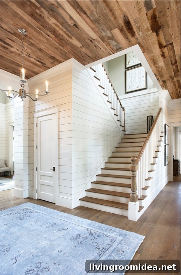 White Shiplap Walls and Reclaimed Wood Ceiling in Stairwell - Markalunas Architecture Group