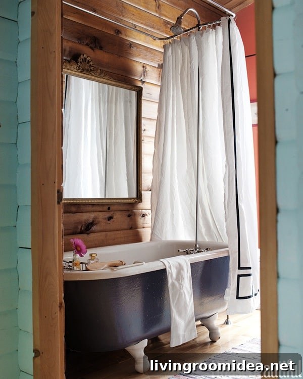 Wood Paneled Bathroom with Gray and White Clawfoot Tub