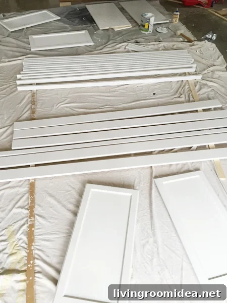 Painted wood pieces drying for bookshelf project