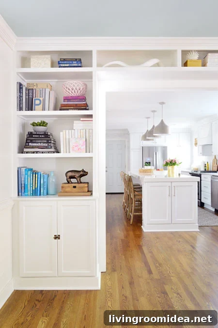built-in bookshelves in opening to kitchen