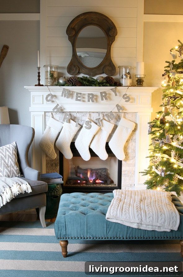 Pottery Barn Glitter Merry Christmas Garland on the Fireplace- The Inspired Room