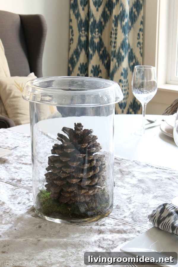 Favorite Home Decor Gifts to Give and Receive 12 Easy Centerpiece - Pinecone and Moss in a Hurricane - The Inspired Room