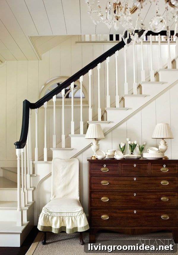 Winter House: 10 Cozy Layers to Warm Up Your Home 4 Winter Entryway - Black and White Staircase - Wood Dresser