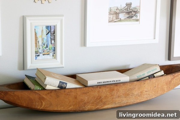 The Inspired Room - Dough bowl filled with vintage books