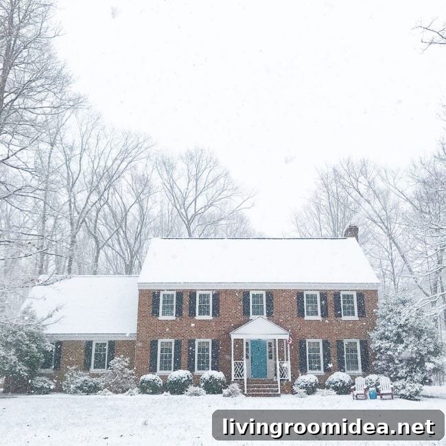 House covered in snow as we drove to the airport