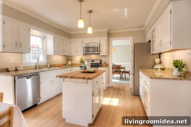 Staged kitchen with island centered